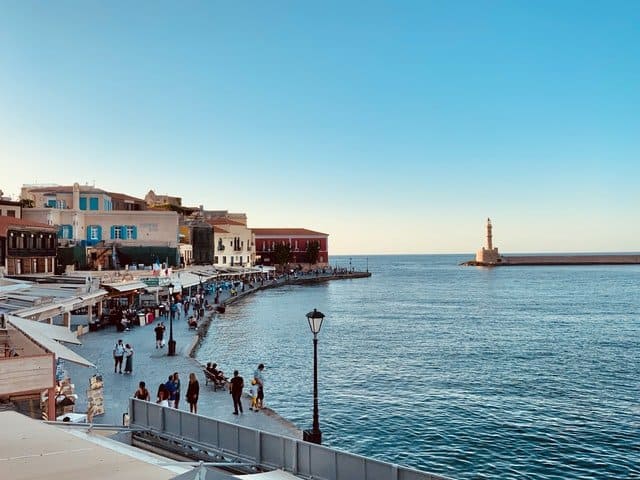 people strolling in Chania old harbour